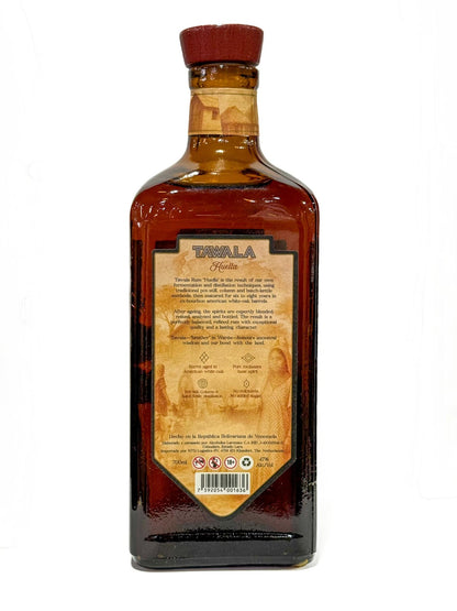 Baksidesetikett på Tawala Huella rom 70 cl, 47 procent alkohol