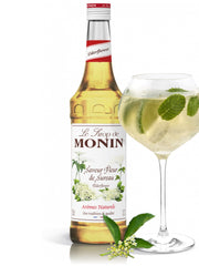 Nyd den subtile og søde duft af hyldeblomst i dine favoritdrinks med Monin Hyldeblomst Sirup